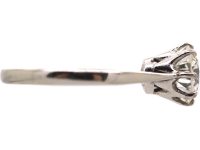 Early 20th Century Platinum Solitaire Ring set with a 1.55 Carat Diamond