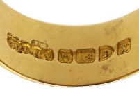 Edwardian 18ct Gold Ornate Buckle Ring set with a Diamond