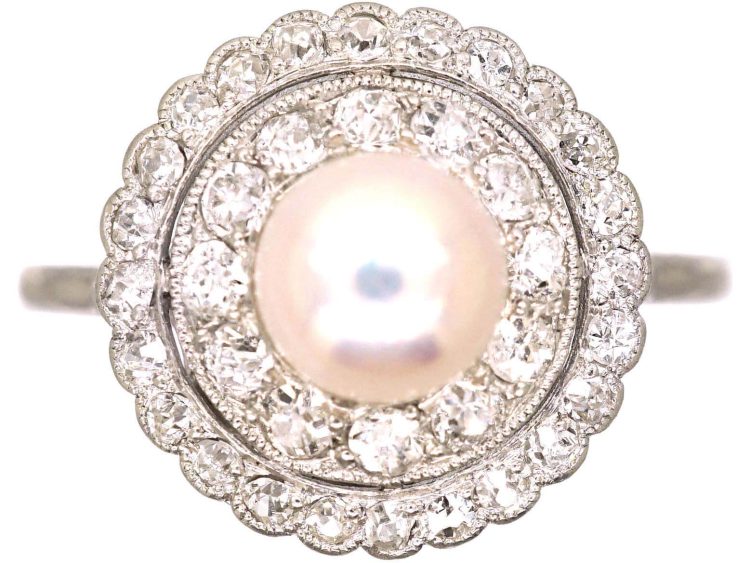 Early 20th Century Platinum Cluster Ring set with a Bouton Pearl & Diamonds