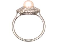 Early 20th Century Platinum Cluster Ring set with a Bouton Pearl & Diamonds