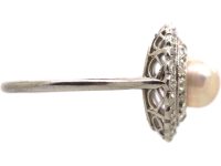 Early 20th Century Platinum Cluster Ring set with a Bouton Pearl & Diamonds