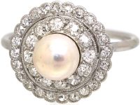 Early 20th Century Platinum Cluster Ring set with a Bouton Pearl & Diamonds