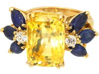 French Modernist 18ct Gold Ring set with a Large Yellow Sapphire, Sapphires & Diamonds