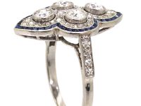 Art Deco French 18ct White Gold Ring set with Diamonds with a Border of Calibre Sapphires