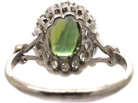 Early 20th Century Platinum Cluster Ring set with an Alexandrite & Diamonds
