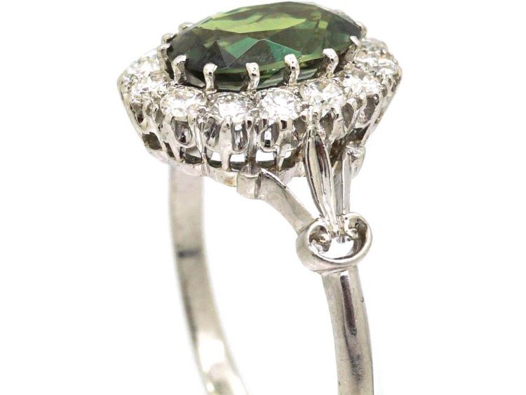 Early 20th Century Platinum Cluster Ring set with an Alexandrite & Diamonds