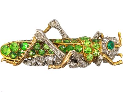 French Early 20th Century 18ct Gold & Platinum Grasshopper Brooch set with Green Garnets & Rose Diamonds & an Emerald