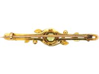 Edwardian 15ct Gold Brooch set with a Peridot & Natural Split Pearls