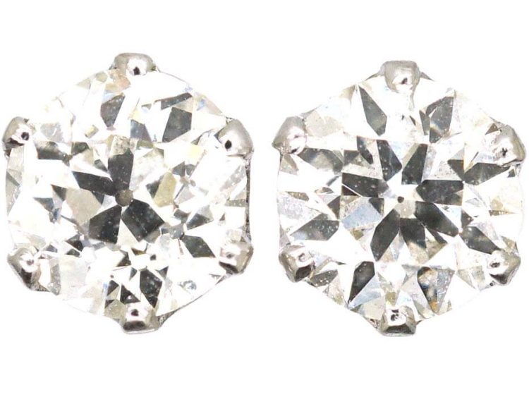 Early 20th Century Platinum Transition Cut Diamond Solitaire Earrings