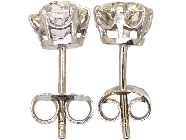 Early 20th Century Platinum Transition Cut Diamond Solitaire Earrings