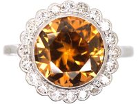 Early 20th Century 18ct White Gold & Platinum Cluster Ring set with a Zircon & Diamonds