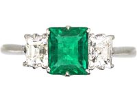 Art Deco Platinum Three Stone Ring set with a Rectangular cut Emerald & Diamonds