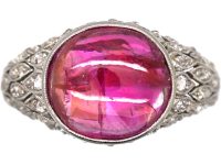 Early 20th Century Platinum Ring set with a Cabochon Ruby & Rose Diamonds