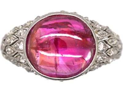 Early 20th Century Platinum Ring set with a Cabochon Ruby & Rose Diamonds