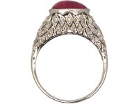 Early 20th Century Platinum Ring set with a Cabochon Ruby & Rose Diamonds