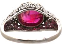 Early 20th Century Platinum Ring set with a Cabochon Ruby & Rose Diamonds