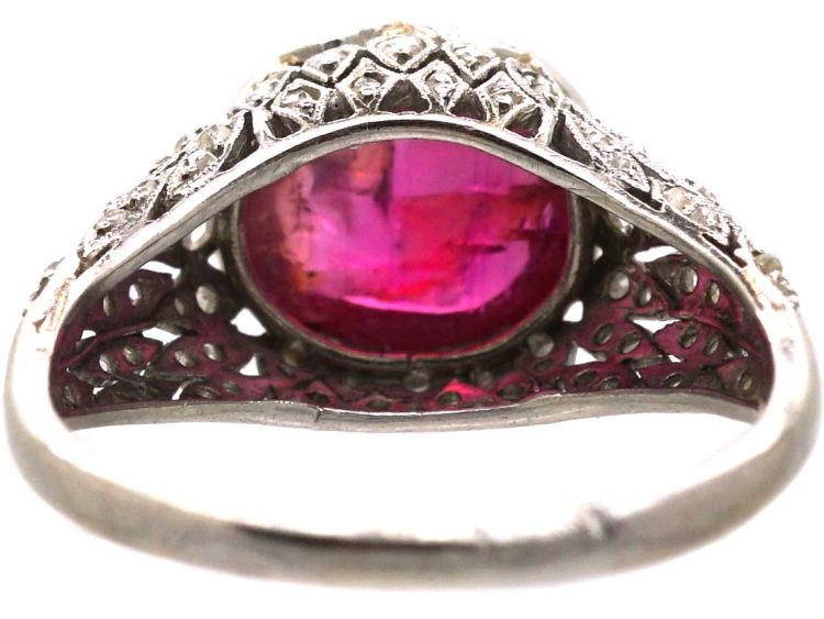 Early 20th Century Platinum Ring set with a Cabochon Ruby & Rose Diamonds