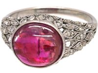 Early 20th Century Platinum Ring set with a Cabochon Ruby & Rose Diamonds