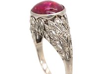 Early 20th Century Platinum Ring set with a Cabochon Ruby & Rose Diamonds