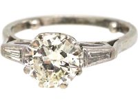 Art Deco Platinum, Diamond Solitaire Ring with Tapered Baguette Diamond Shoulders