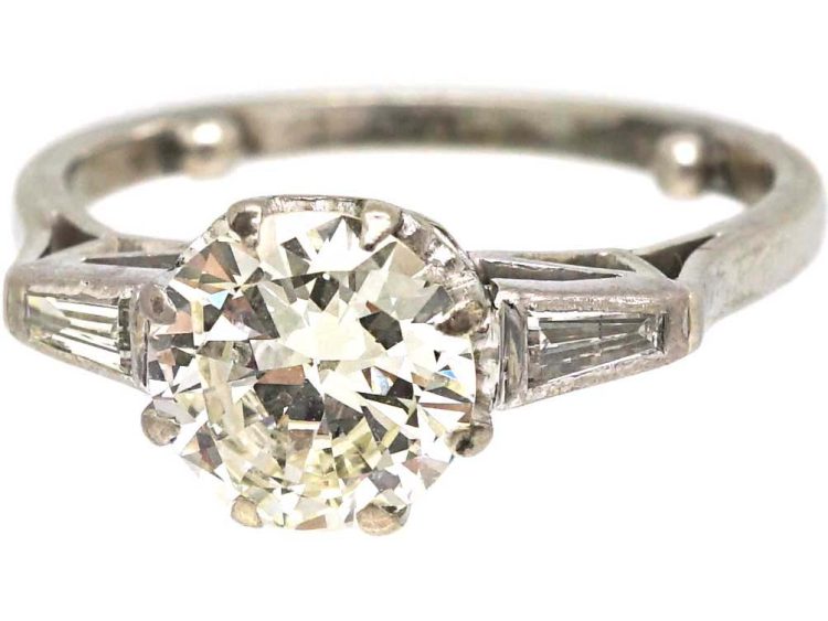 Art Deco Platinum, Diamond Solitaire Ring with Tapered Baguette Diamond Shoulders