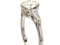 Art Deco Platinum, Diamond Solitaire Ring with Tapered Baguette Diamond Shoulders