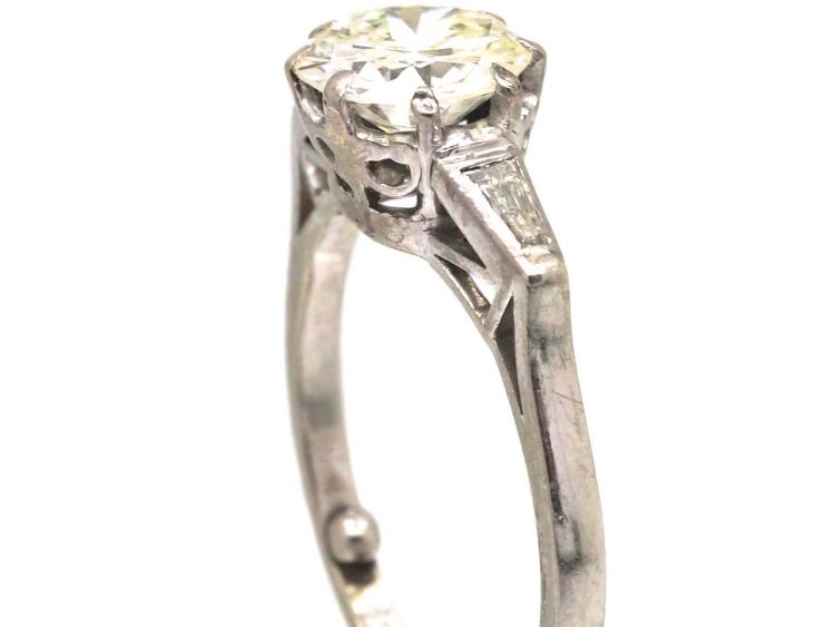Art Deco Platinum, Diamond Solitaire Ring with Tapered Baguette Diamond Shoulders