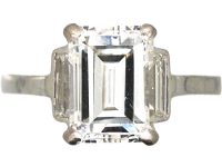 Art Deco 18ct White Gold Ring set with a Rectangular Cut Diamond with Baguette Cut Diamond Shoulders