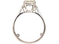 Art Deco 18ct White Gold Ring set with a Rectangular Cut Diamond with Baguette Cut Diamond Shoulders