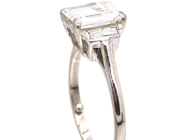 Art Deco 18ct White Gold Ring set with a Rectangular Cut Diamond with Baguette Cut Diamond Shoulders