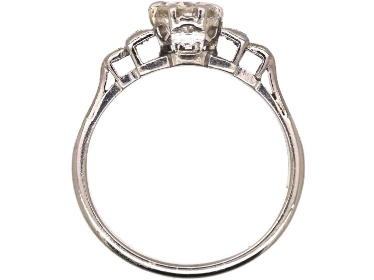 Art Deco Platinum Solitaire Diamond Ring with Step Cut Shoulders set with Baguette Diamonds