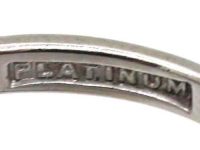Art Deco Platinum Solitaire Diamond Ring with Step Cut Shoulders set with Baguette Diamonds