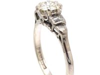Art Deco Platinum Solitaire Diamond Ring with Step Cut Shoulders set with Baguette Diamonds