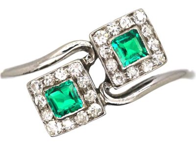 Art Deco Platinum Crossover Ring set with Two Emeralds & Diamonds