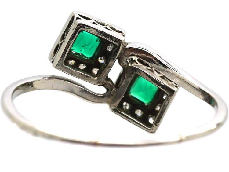 Art Deco Platinum Crossover Ring set with Two Emeralds & Diamonds
