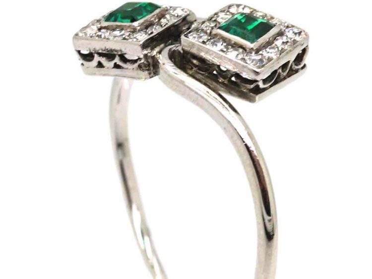 Art Deco Platinum Crossover Ring set with Two Emeralds & Diamonds