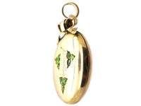 Edwardian 9ct Gold Back & Front Round Locket set with Green Garnets