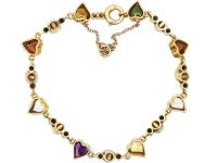 Early 20th Century French 18ct Gold Witch's Hearts Bracelet set with Gem Stones