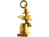 Edwardian 9ct Gold Charm of Cupid Sitting on a Barrel Drinking Wine