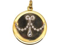 Edwardian 15ct Gold & Platinum Round Locket with Rose Diamond set Swag & Bow Motif