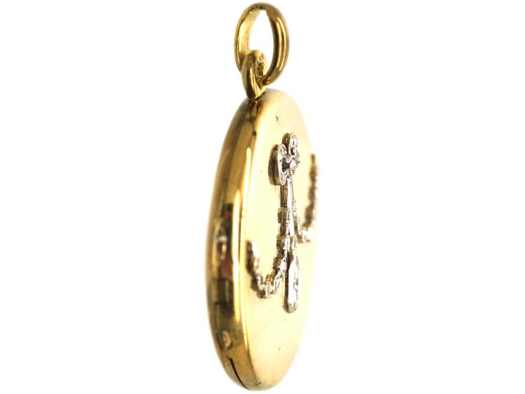 Edwardian 15ct Gold & Platinum Round Locket with Rose Diamond set Swag & Bow Motif