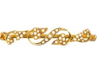 Edwardian 15ct Gold Bangle with Leaf Motifs set with Natural Split Pearls