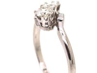 Art Deco Platinum Two Stone Diamond Crossover Ring with Small Baguette Diamond Shoulders