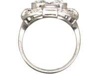 Art Deco Platinum Two Stone Diamond Ring with an Oval Surround of Baguette & Round Diamonds