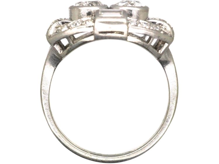 Art Deco Platinum Two Stone Diamond Ring with an Oval Surround of Baguette & Round Diamonds