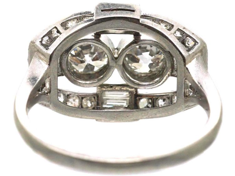 Art Deco Platinum Two Stone Diamond Ring with an Oval Surround of Baguette & Round Diamonds