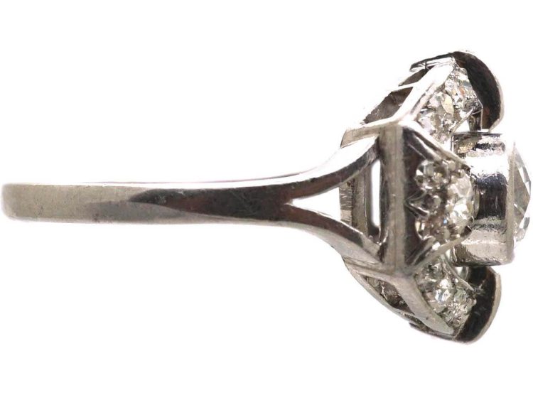 Art Deco Platinum Two Stone Diamond Ring with an Oval Surround of Baguette & Round Diamonds