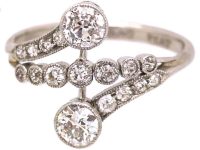 Edwardian Platinum Fancy Crossover Ring set with Diamonds