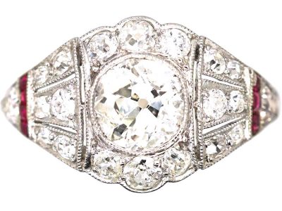 Art Deco Platinum Ring set with Principal Diamond Surrounded by Diamonds & Calibre Rubies