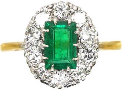 Early 20th Century 18ct Gold, Rectangular Cut Emerald & Diamond Oval Cluster Ring